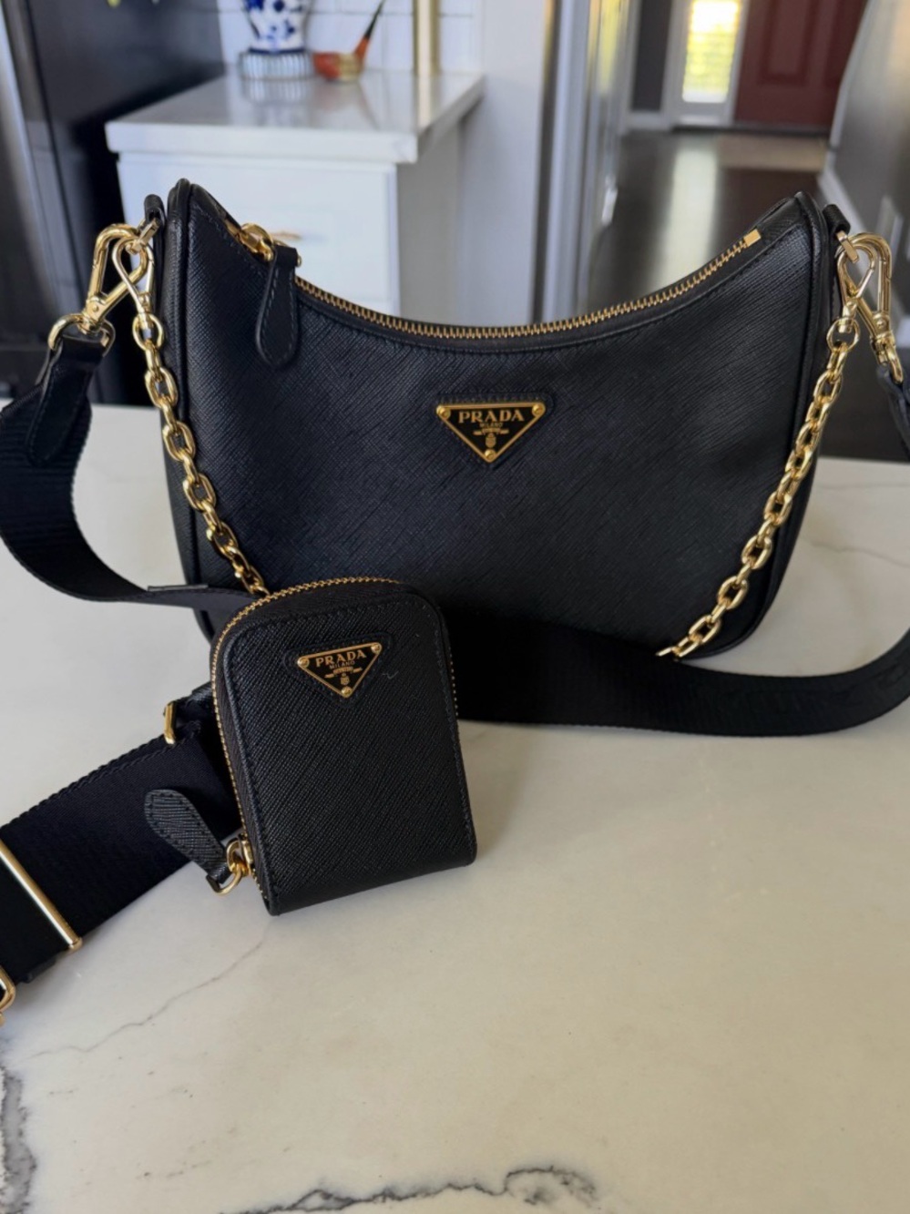 Prada Black Saffiano Leather Shoulder Bag with Gold Chain Accents